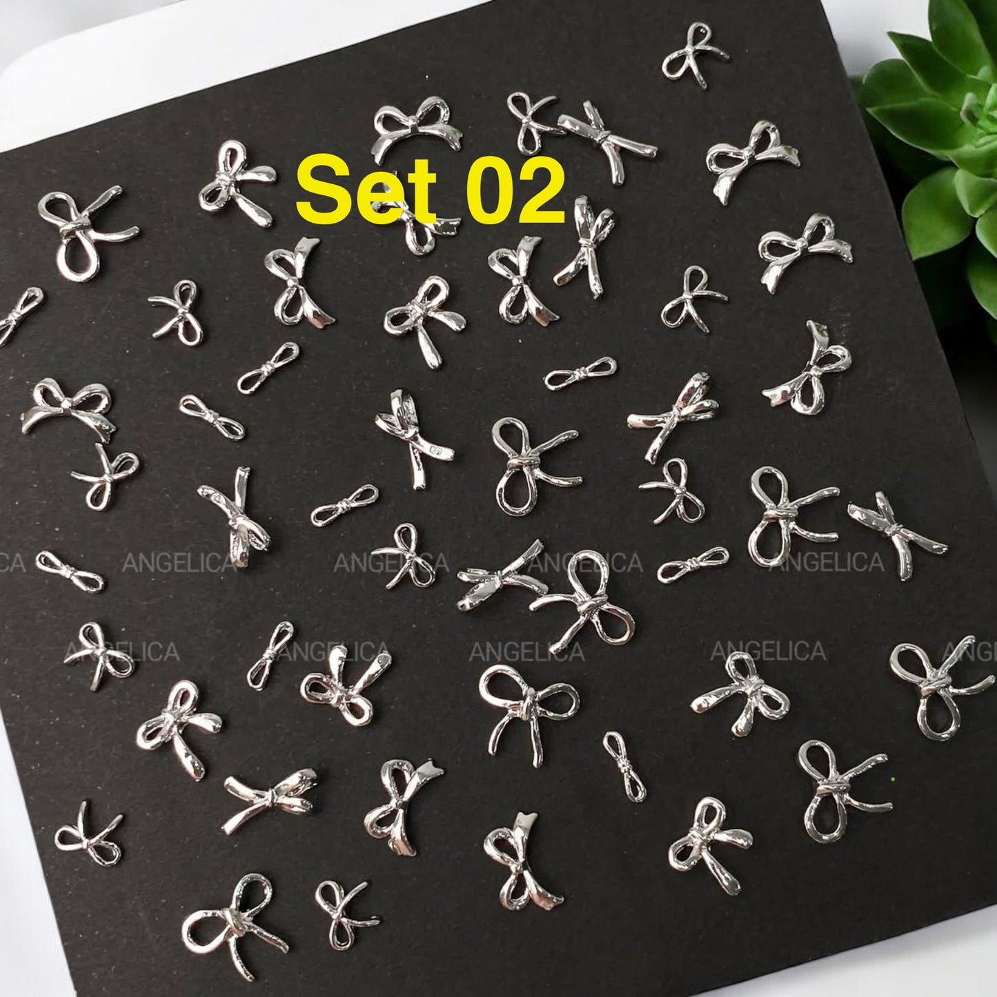 Set 50pcs Mini Silver Metal Bow Nail Charm