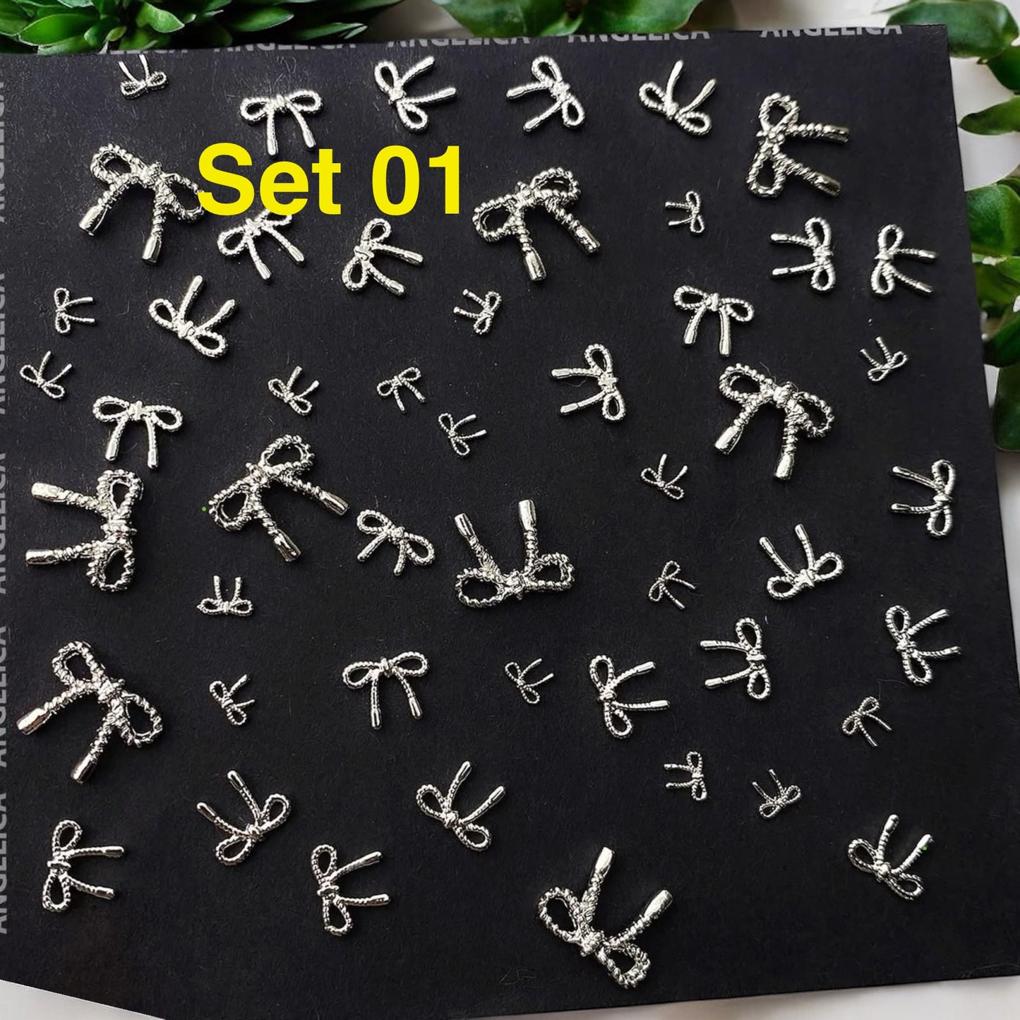 Set 50pcs Mini Silver Metal Bow Nail Charm