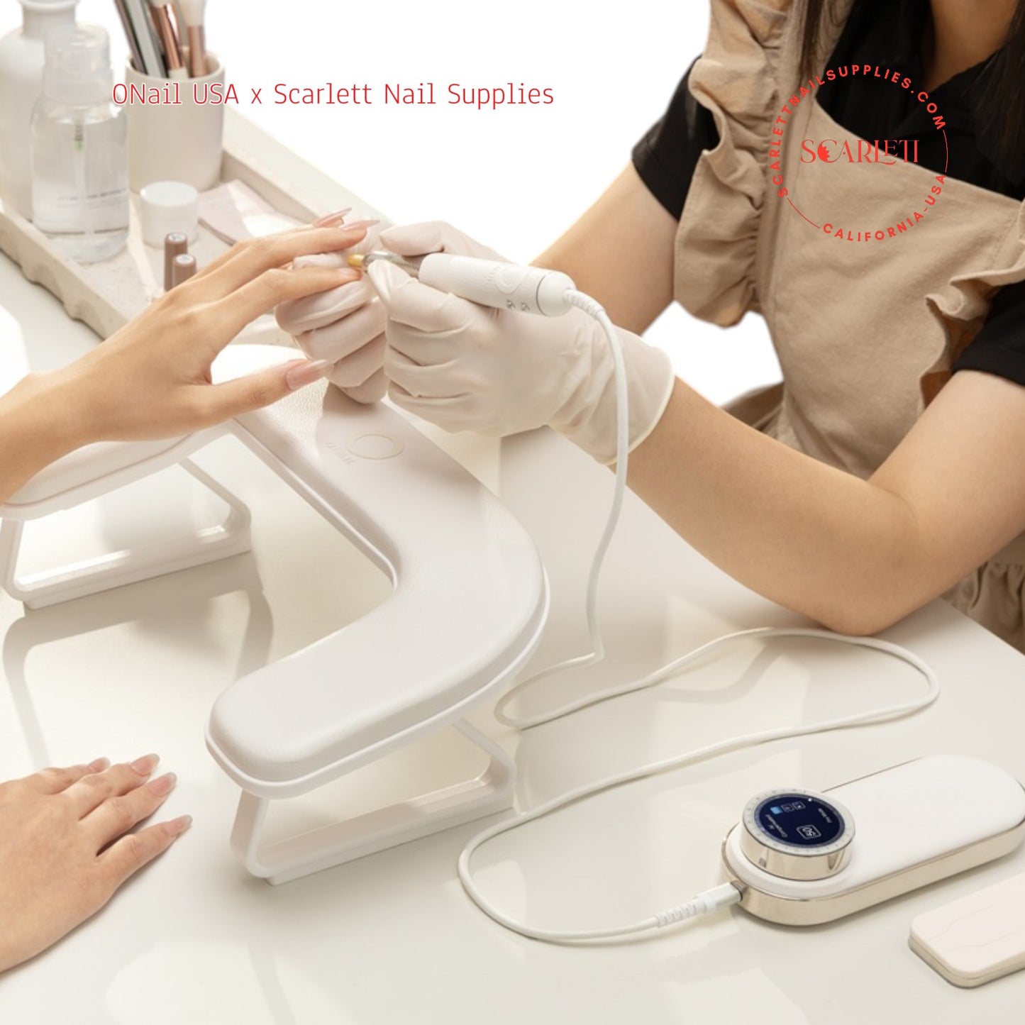Nail technician using ONAIL AI Nail Drill on client at nail salon table.