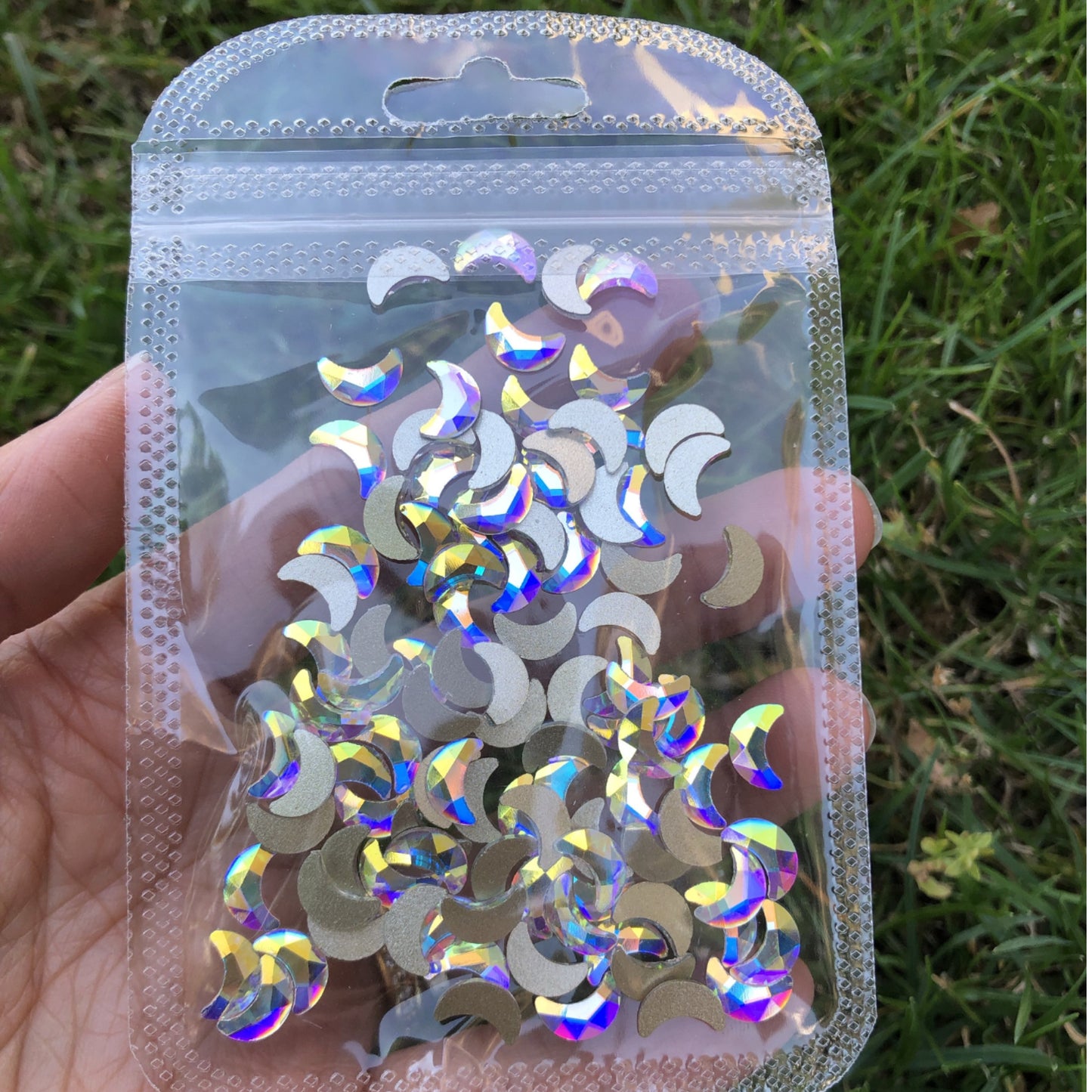 Flatback Rhinestone For Nail Art - Moon Shape - Crystal AB. Crystal AB coating. Silver foiling enhance the reflectivity and make more attractive